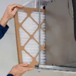 Brand new clean furnace air filter ready for installation in Fullerton CA home