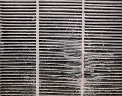 Dirty clogged furnace filter before service