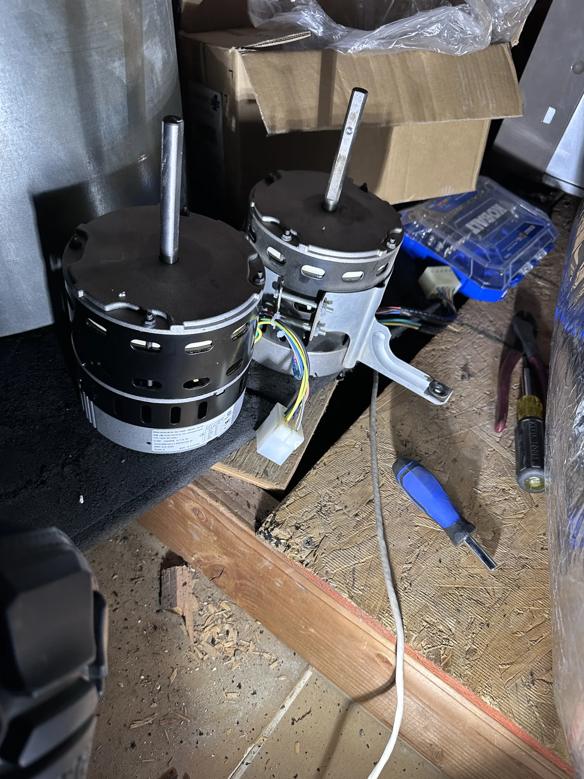 technician repairing ecm blower motor