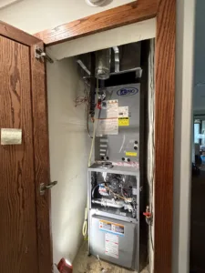 open hvac hall closet shows a legit air new ac pro furnace installation in closet of fullerton ca home